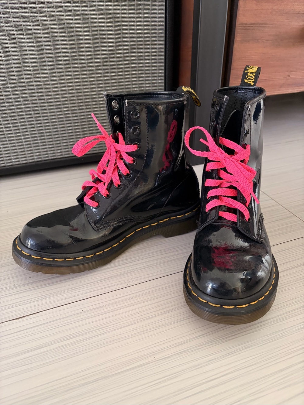 Kids Black Patent Dr. Martens Combat Boots with Pink Laces